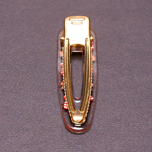 barrette à cheveux artisanale en résine, mon petit bonhomme de pain d'épice. Ornée de bonhommes de pain d'épices et de cannes à sucre. parfaite pour noël