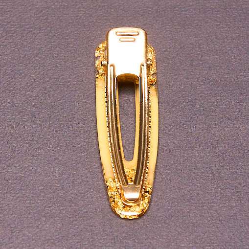 Barrette à cheveux en résine artisanale. Trésors de Luciole. dorée et feuille d'or., sublimez votre coiffure avec cette barrette à cheveux soyeuse.