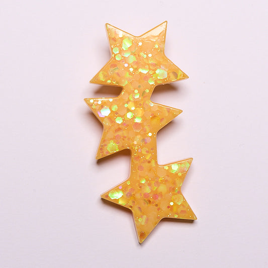 barrette résine étoile jaune pailletée phosphorescente Lucie