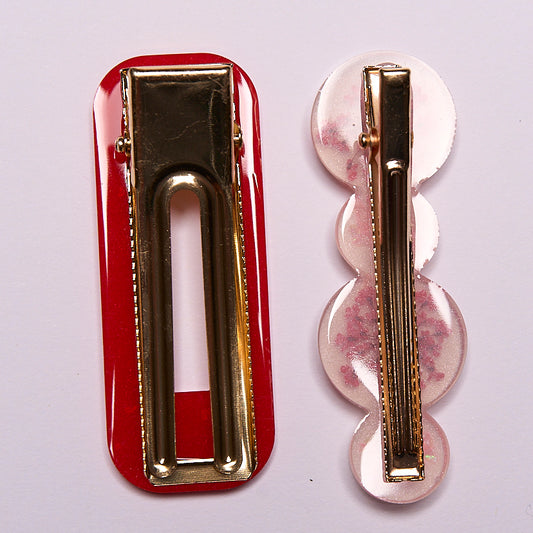 pince à cheveux fleurs séchées rouge en résine