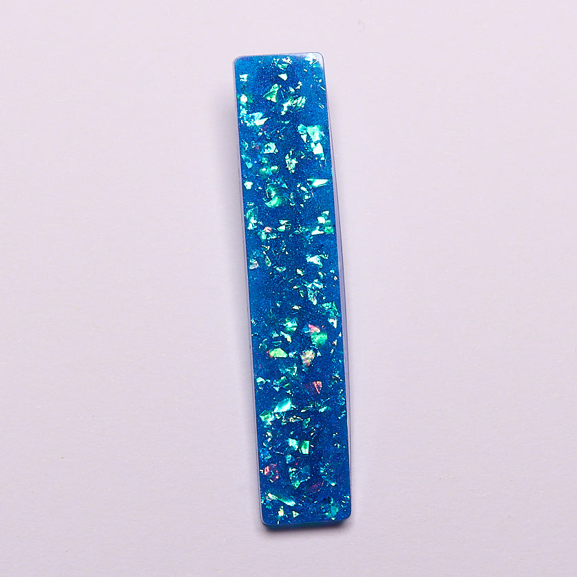 barrette en résine bleue pailletée 